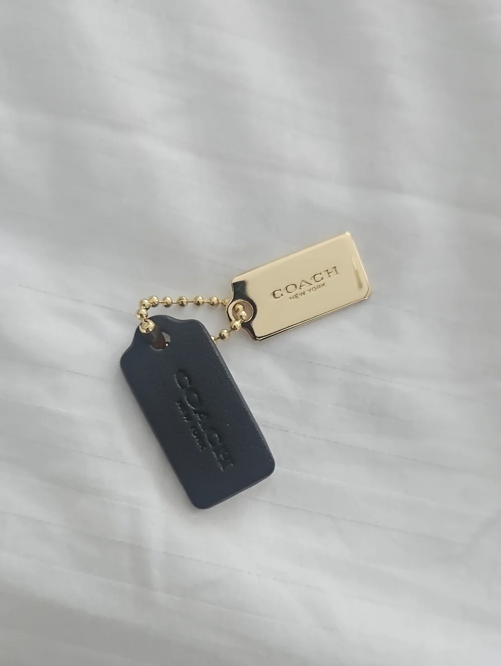 Coach Metal And Leather Tag